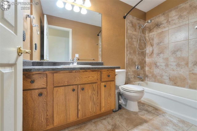 355 Antero Dr, Canon City, CO 81212 - bathroom featuring shower / washtub combination, vanity, a textured wall, and tile patterned floors