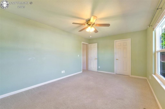 355 Antero Dr, Canon City, CO 81212 - unfurnished bedroom with light carpet and ceiling fan