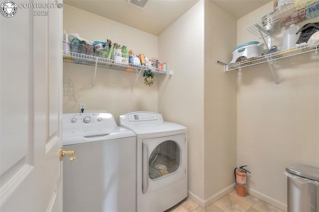 355 Antero Dr, Canon City, CO 81212 - washroom featuring washer and clothes dryer and baseboards