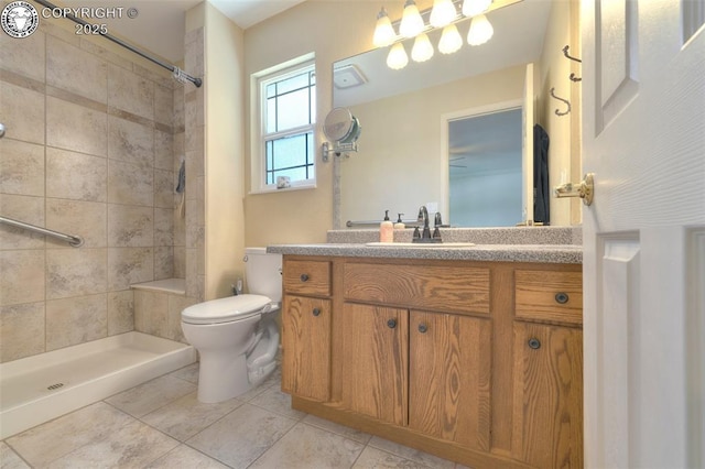355 Antero Dr, Canon City, CO 81212 - bathroom with vanity, tiled shower, and tile patterned floors