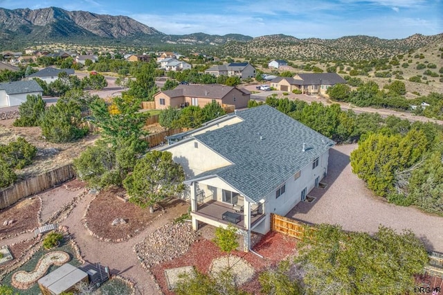 drone / aerial view featuring a mountain view