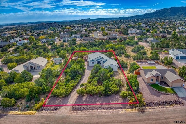 drone / aerial view featuring a mountain view