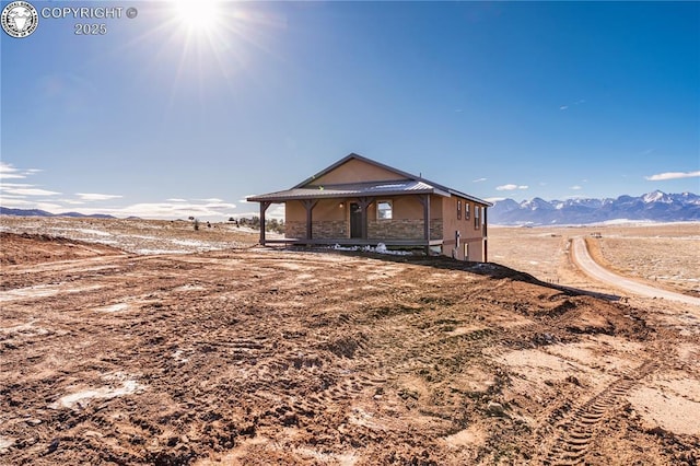 view of front facade with a mountain view