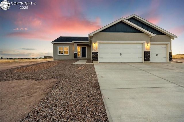 craftsman inspired home featuring a garage