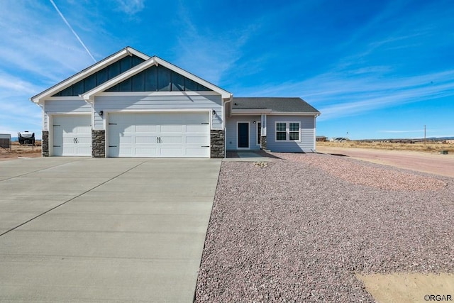 craftsman-style home with a garage