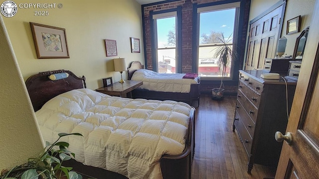 120 E Main St, Florence, CO 81226 - bedroom featuring dark wood-style floors