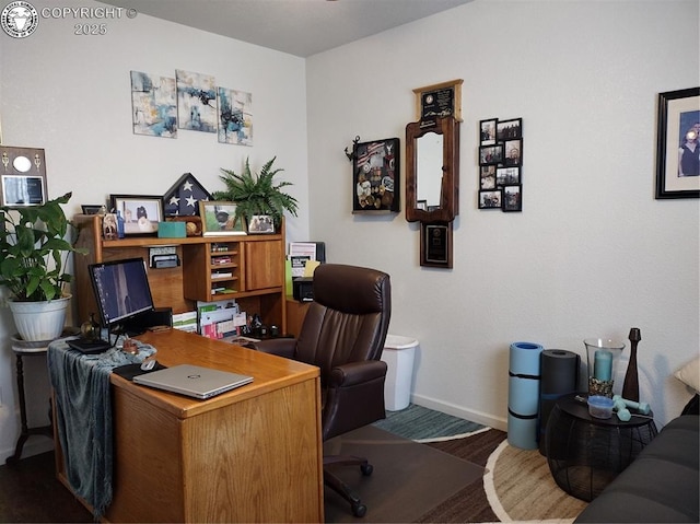 office area featuring baseboards