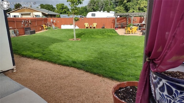 view of yard featuring a fenced backyard and a pergola