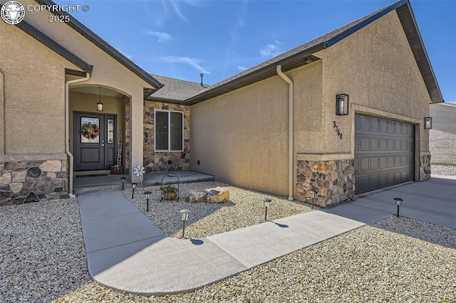 entrance to property featuring a garage