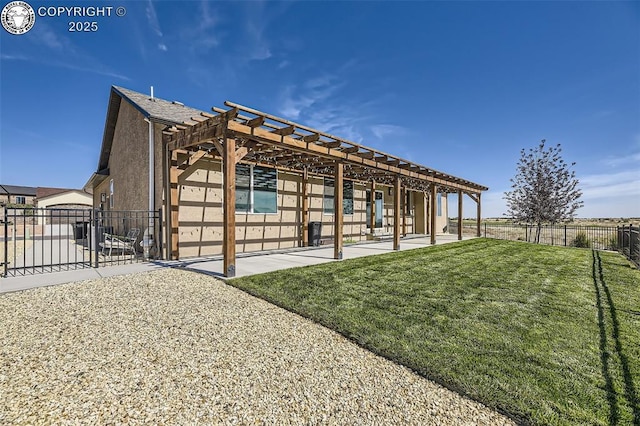 exterior space featuring a yard and a patio area