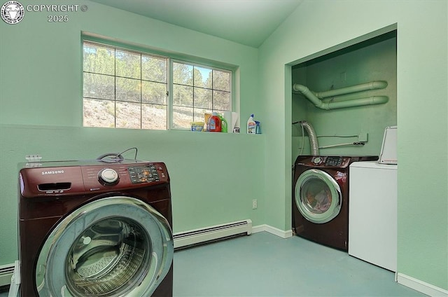 laundry room with a baseboard heating unit, laundry area, baseboards, and washing machine and clothes dryer