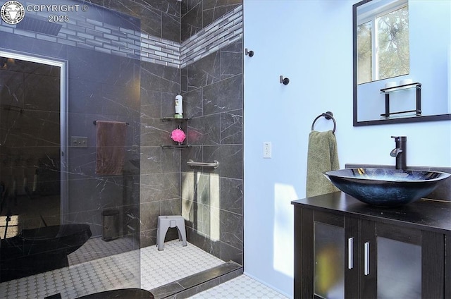 bathroom with vanity and walk in shower