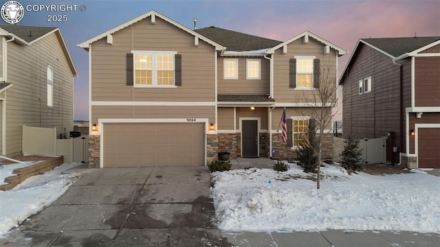 view of front of home with a garage