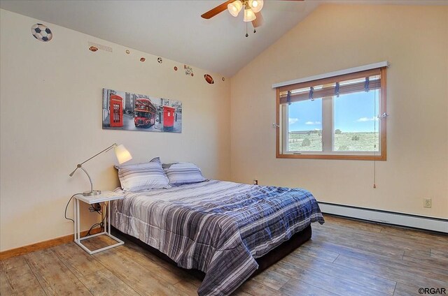 bedroom featuring hardwood / wood-style flooring, vaulted ceiling, ceiling fan, and baseboard heating