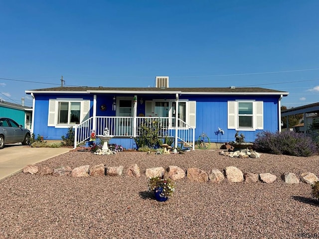 single story home with covered porch