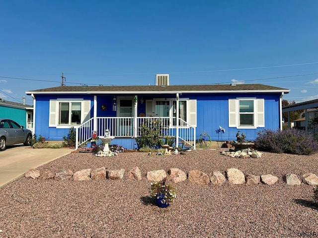 ranch-style home featuring covered porch