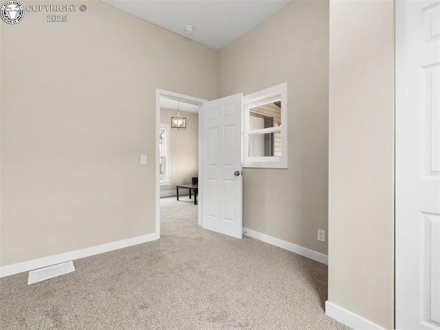 932 Elm St, Pueblo, CO 81004 - spare room with carpet flooring, a smoke detector, and baseboards