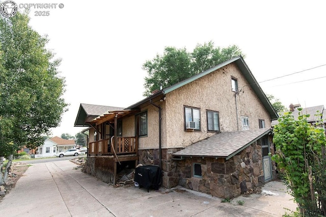 view of home's exterior featuring cooling unit