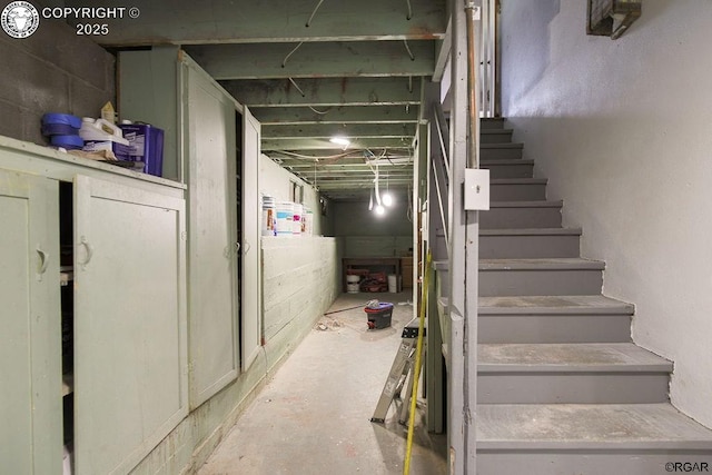 stairway with concrete floors