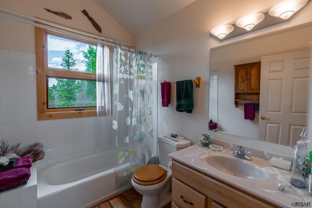 full bathroom with shower / bathtub combination with curtain, vanity, wood-type flooring, vaulted ceiling, and toilet