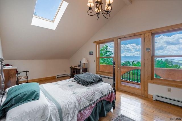 bedroom featuring access to outside, vaulted ceiling with skylight, a chandelier, and a baseboard radiator