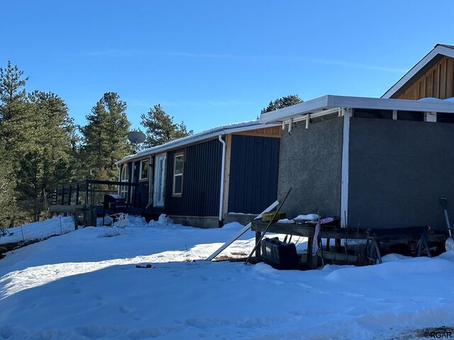 view of snow covered property