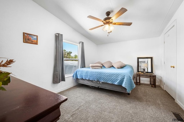 carpeted bedroom featuring vaulted ceiling and ceiling fan