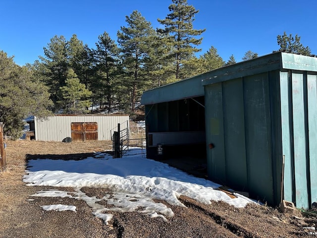 exterior space with an outbuilding