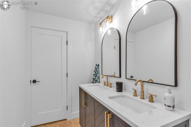 bathroom featuring vanity and tile patterned flooring