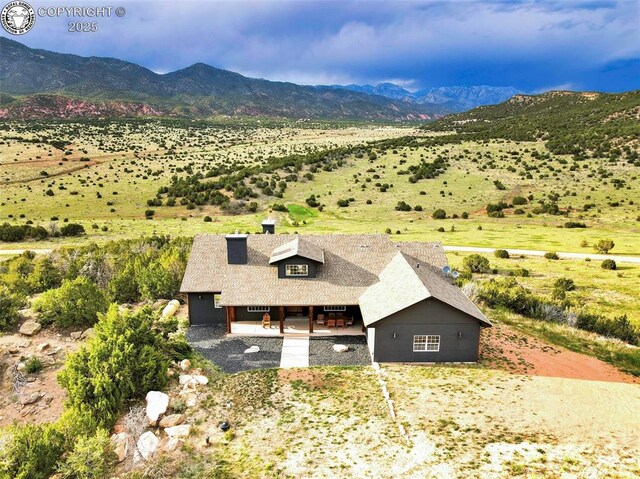 aerial view featuring a mountain view