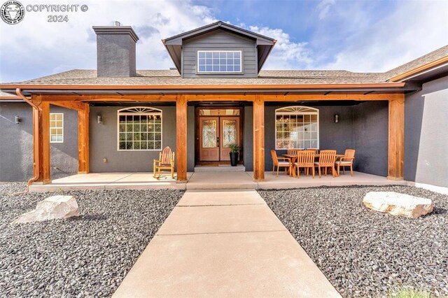 rear view of property with a patio area