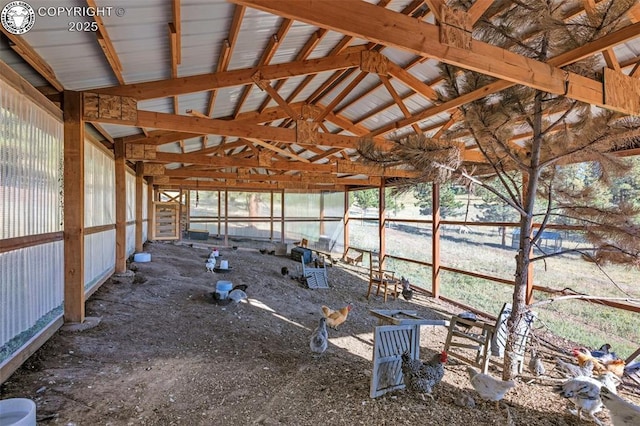 unfurnished sunroom with vaulted ceiling