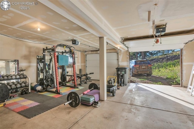 garage featuring a garage door opener