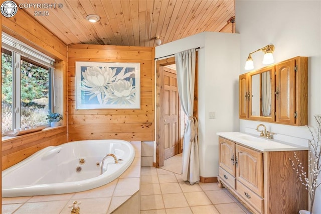 bathroom featuring wood walls, vanity, tile patterned flooring, wooden ceiling, and a whirlpool tub