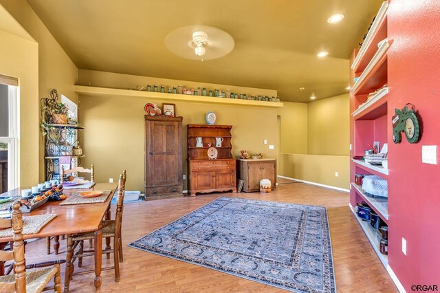 dining room with hardwood / wood-style floors