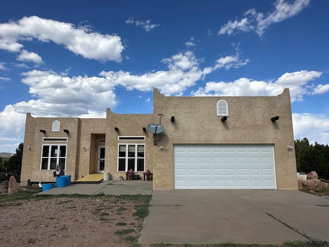 adobe home with a garage