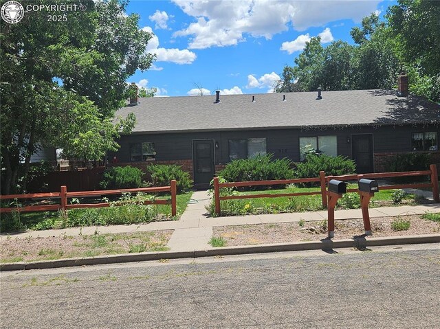 910 Allison Ave Unit A & B, Canon City, CO 81212 - ranch-style house featuring brick siding and a chimney