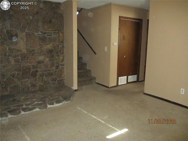 910 Allison Ave Unit A & B, Canon City, CO 81212 - below grade area featuring stairs, carpet floors, and crown molding