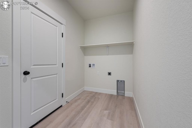 clothes washing area with hookup for a washing machine, hookup for an electric dryer, and light wood-type flooring