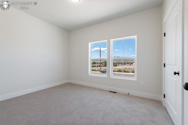 view of carpeted spare room