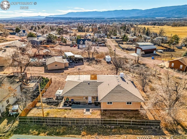 drone / aerial view featuring a mountain view