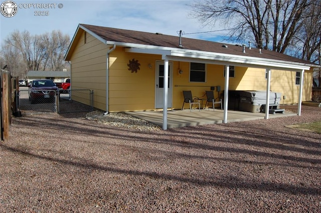 rear view of house featuring a patio area