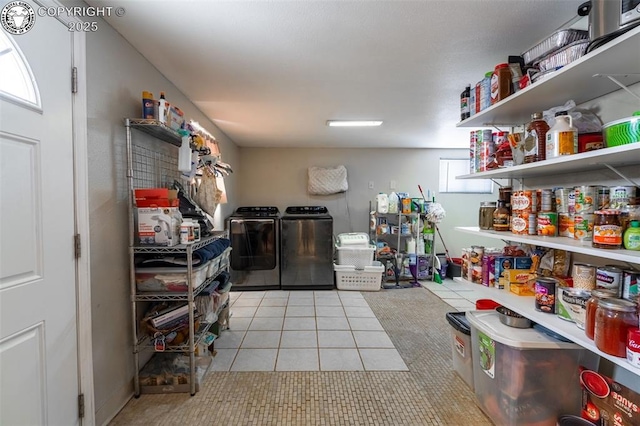 pantry featuring separate washer and dryer