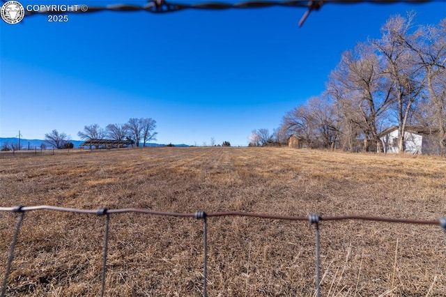 view of yard featuring a rural view