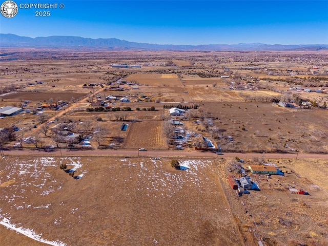 bird's eye view with a mountain view