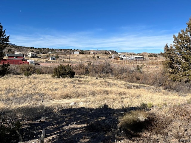 property view of mountains featuring a rural view