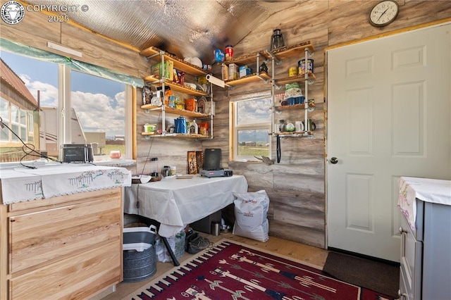 office featuring vaulted ceiling and wooden ceiling