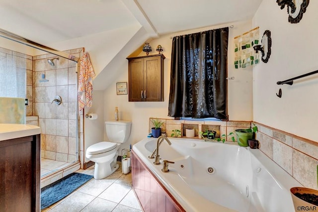 bathroom with tile patterned floors, toilet, and separate shower and tub