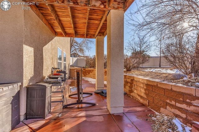 view of snow covered patio