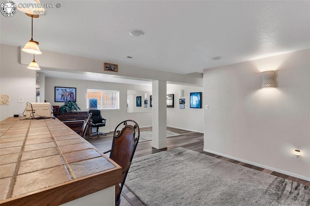 office space with hardwood / wood-style flooring